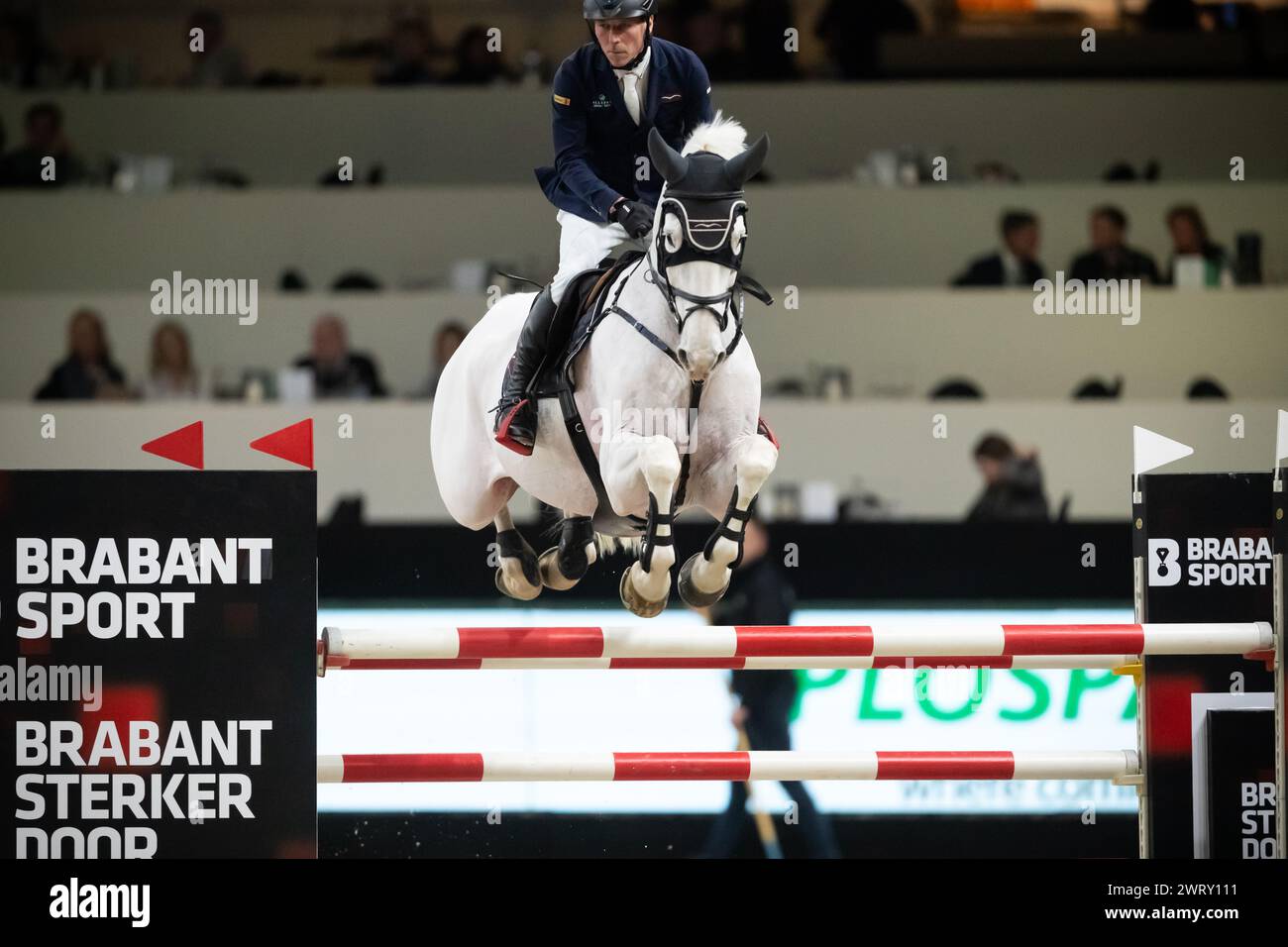 Denbosch, Netherlands - March 10, 2024. Hans-Dieter Dreher of Germany riding Elysium compete in a 1.45 Speed Class during the 2024 Rolex Dutch Masters Stock Photo