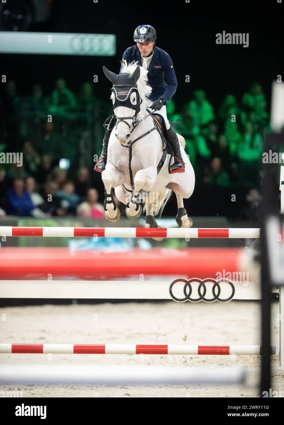 Denbosch, Netherlands - March 10, 2024. Hans-Dieter Dreher of Germany riding Elysium compete in a 1.45 Speed Class during the 2024 Rolex Dutch Masters Stock Photo