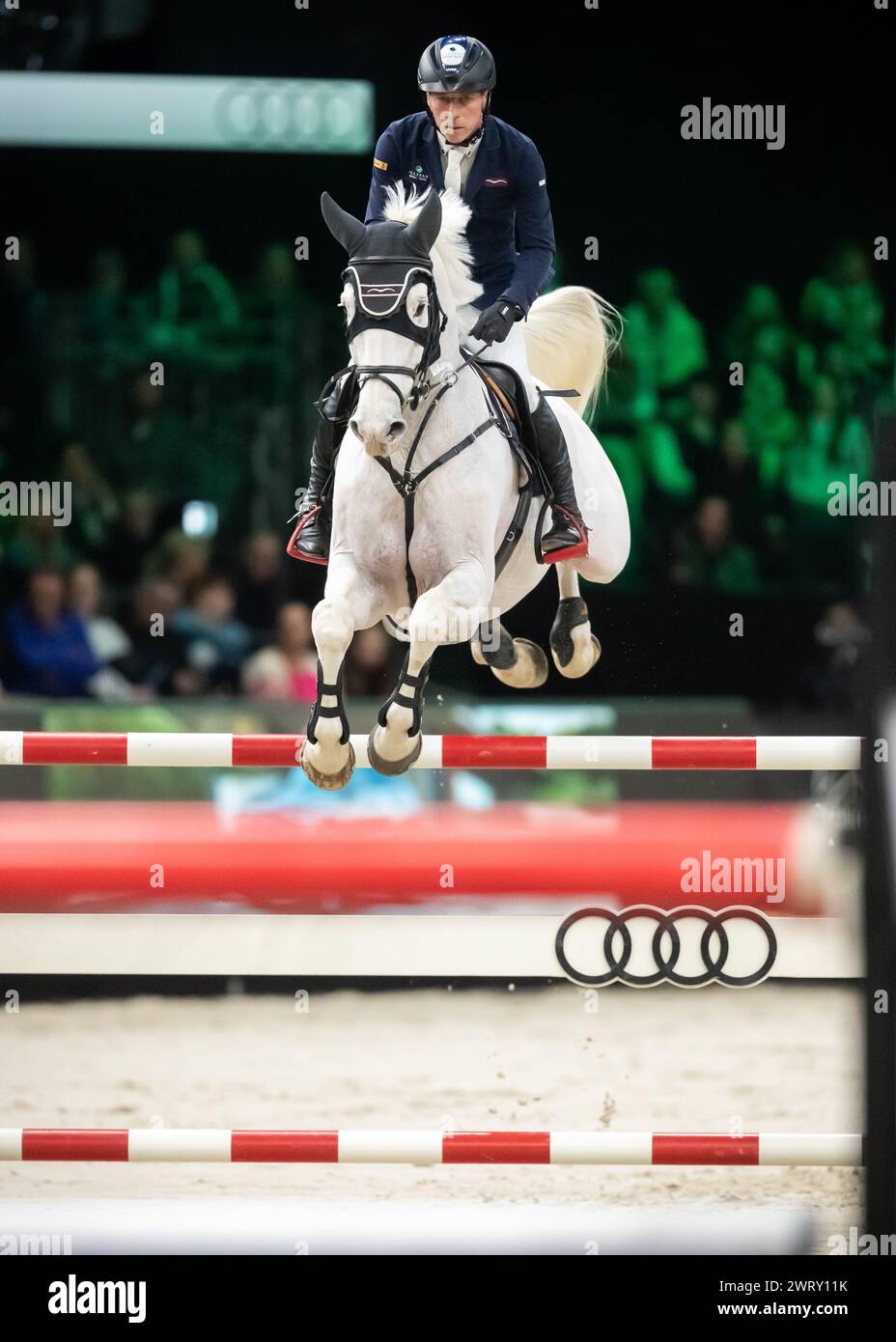 Denbosch, Netherlands - March 10, 2024. Hans-Dieter Dreher of Germany riding Elysium compete in a 1.45 Speed Class during the 2024 Rolex Dutch Masters Stock Photo