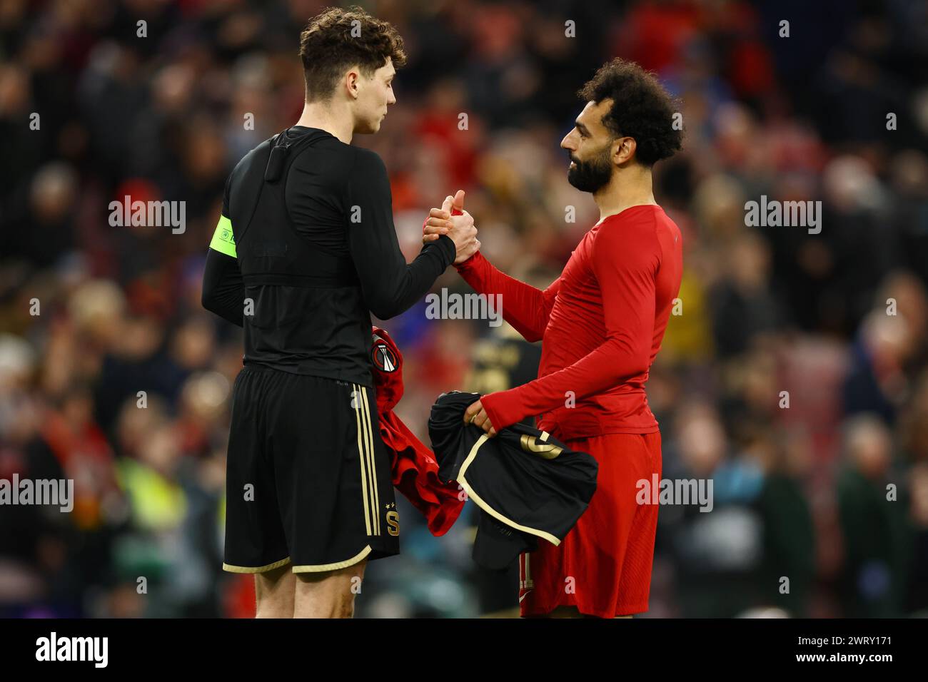 Liverpool, UK. 14th Mar, 2024. Mohamed Salah of Liverpool swaps shirts at full time during the UEFA Europa League Round of 16 match at Anfield, Liverpool. Picture credit should read: Gary Oakley/Sportimage Credit: Sportimage Ltd/Alamy Live News Stock Photo