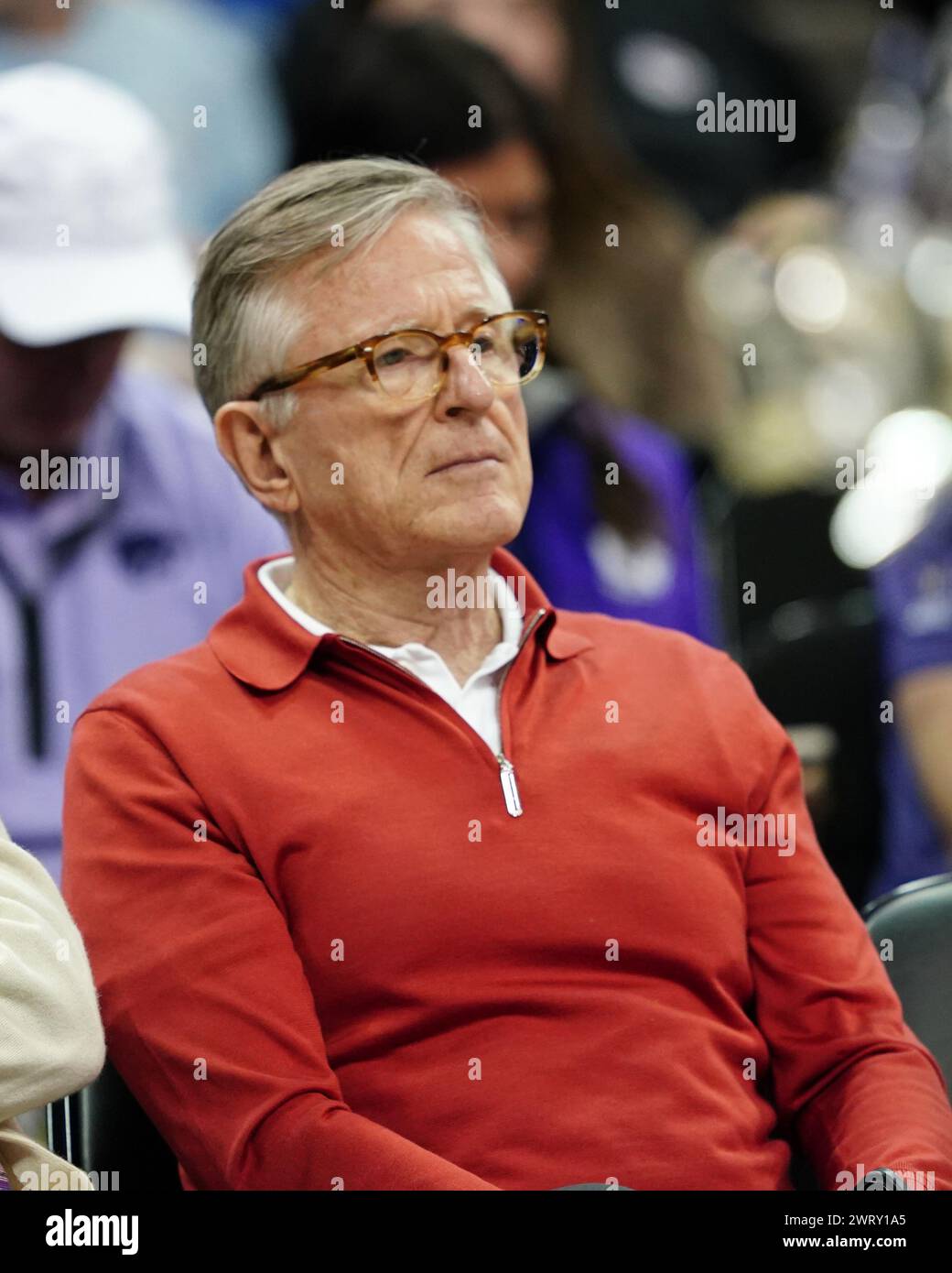 mar-14-2024-university-of-kansas-alumni-davis-booth-enjoys-the-tcu-vs