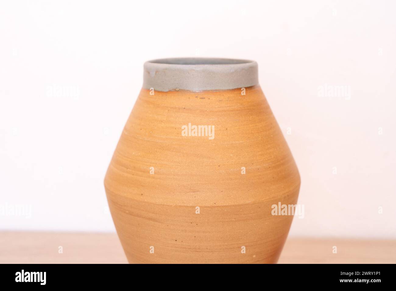 Handmade ceramic vase, white background, red. High quality photo Stock Photo