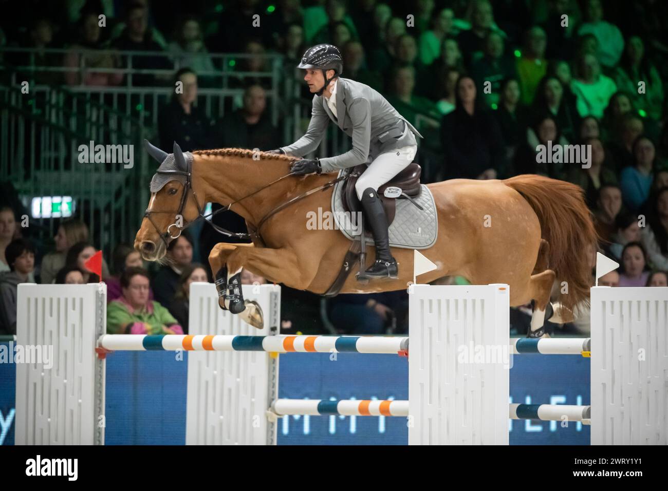 Denbosch, Netherlands - March 10, 2024. Christian Kukuk of Germany and riding Nice Van't Zorgvliet compete in a 1.45 Speed Class during the 2024 Rolex Stock Photo