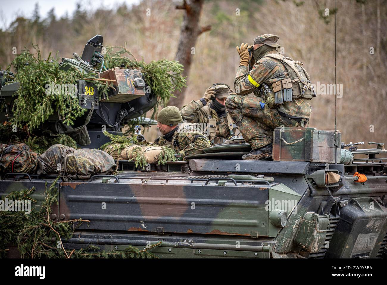 Members of the German Army's 411th Panzergrenadier Battalion regroup