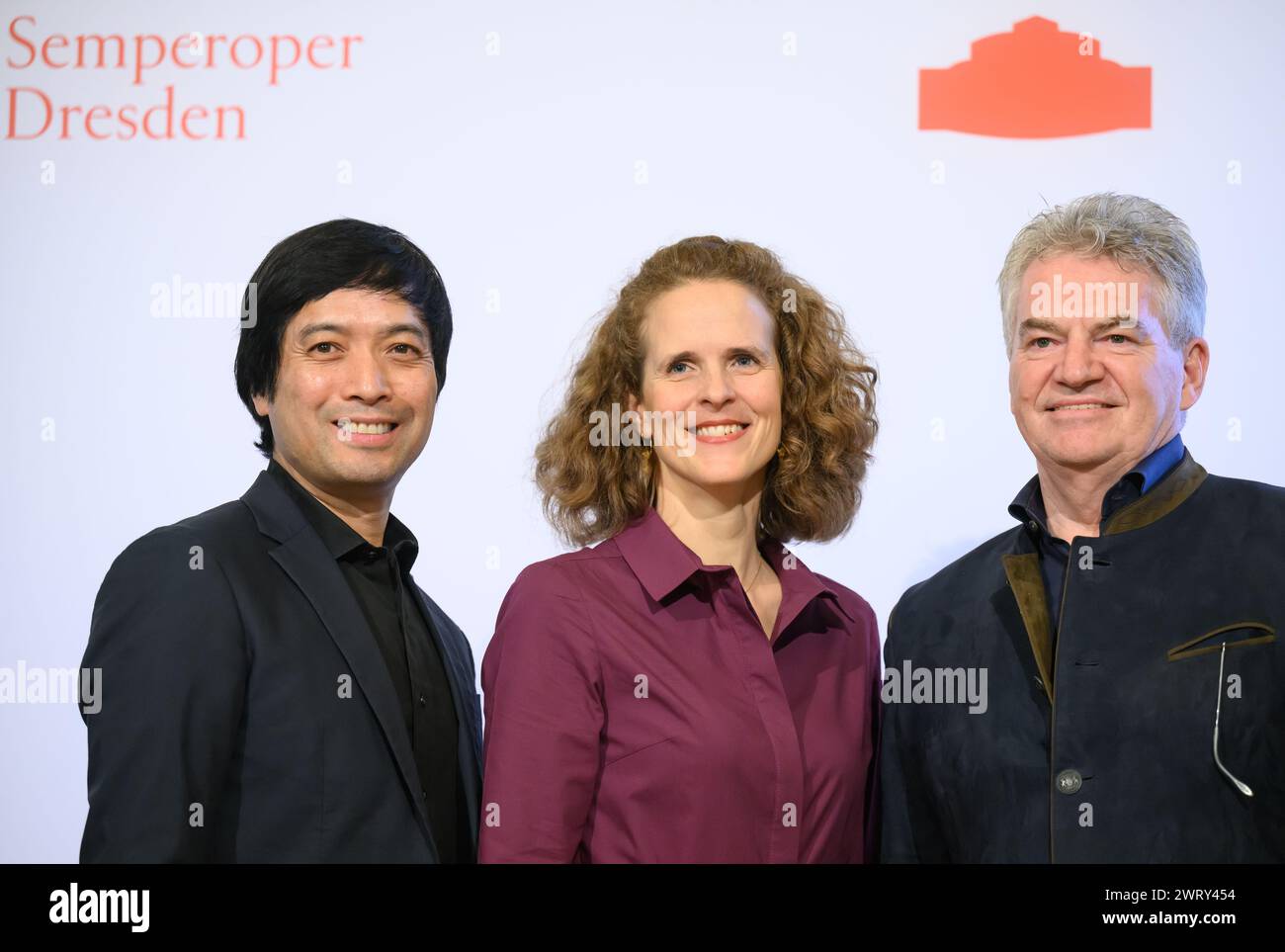 Dresden, Germany. 14th Mar, 2024. Nora Schmid (M), designated Artistic Director of the Semperoper Dresden, Kinsun Chan (l), the future Director of the Semperoper Ballett, and Wolfgang Rothe, Commercial Director of the Semperoper, stand in the Rundfoyer of the Opera House before the start of the press conference on the 2024/2025 season presentation. Credit: Robert Michael/dpa/Alamy Live News Stock Photo