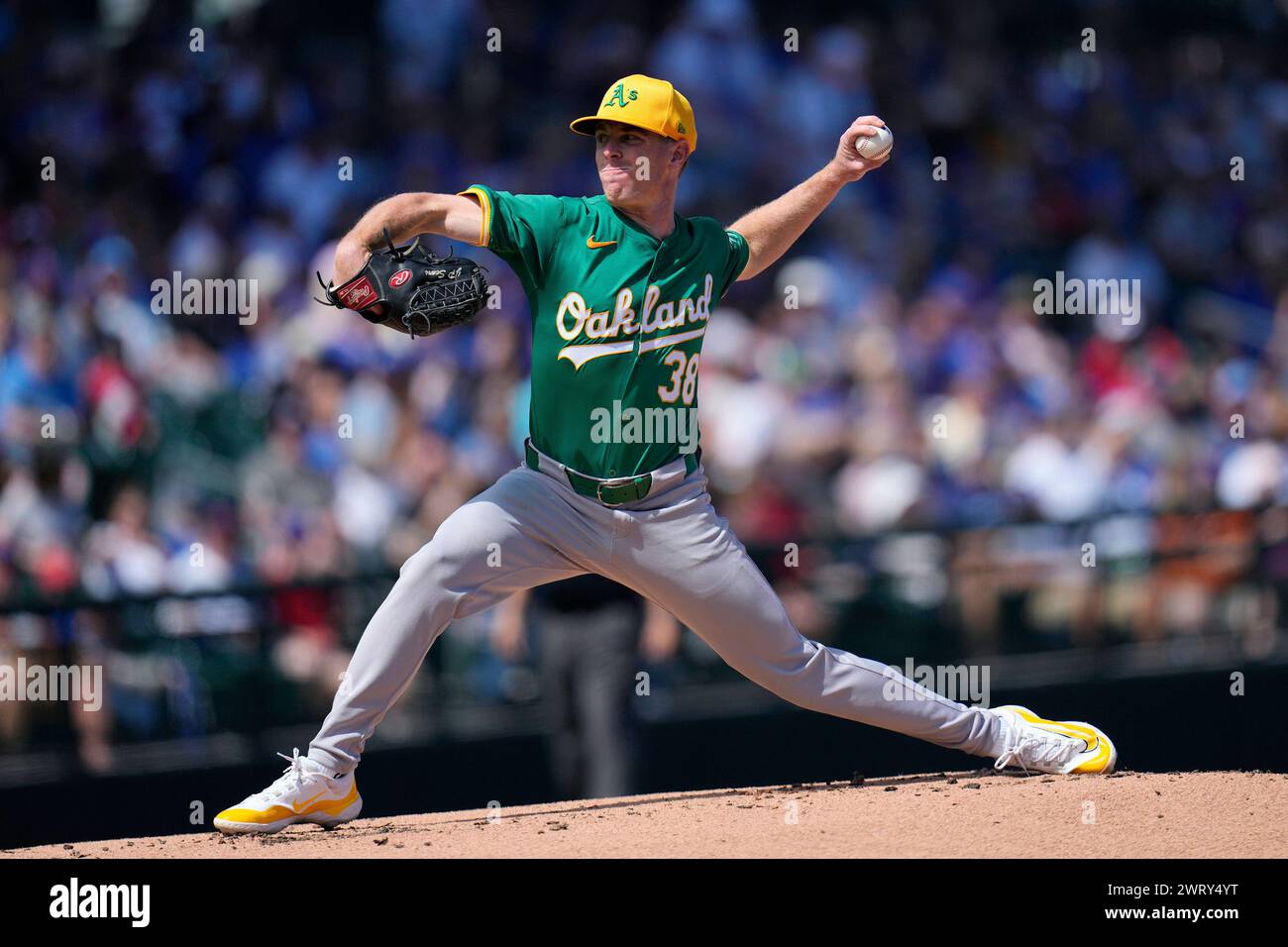 Oakland Athletics starting pitcher JP Sears throws to a Chicago Cubs