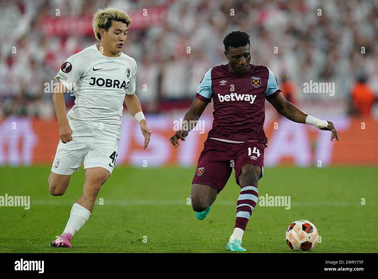 Mohammed Kudus of West Ham United under pressure from Ritsu Doan of SC