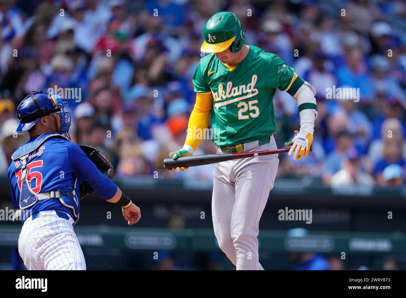 Oakland Athletics' Brent Rooker (25) walks back to the dugout after