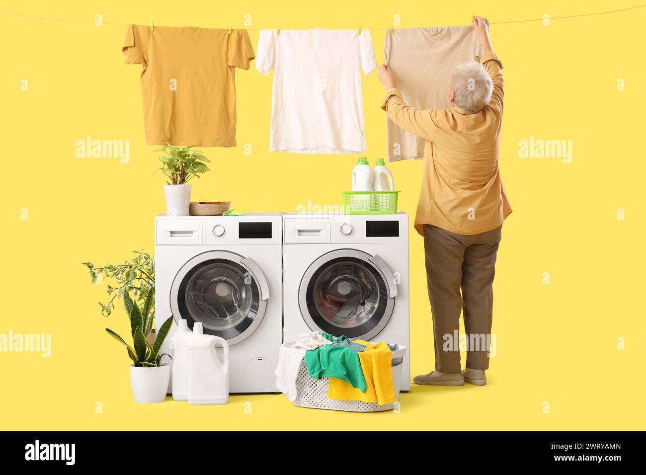 Old woman doing laundry on hi-res stock photography and images - Alamy