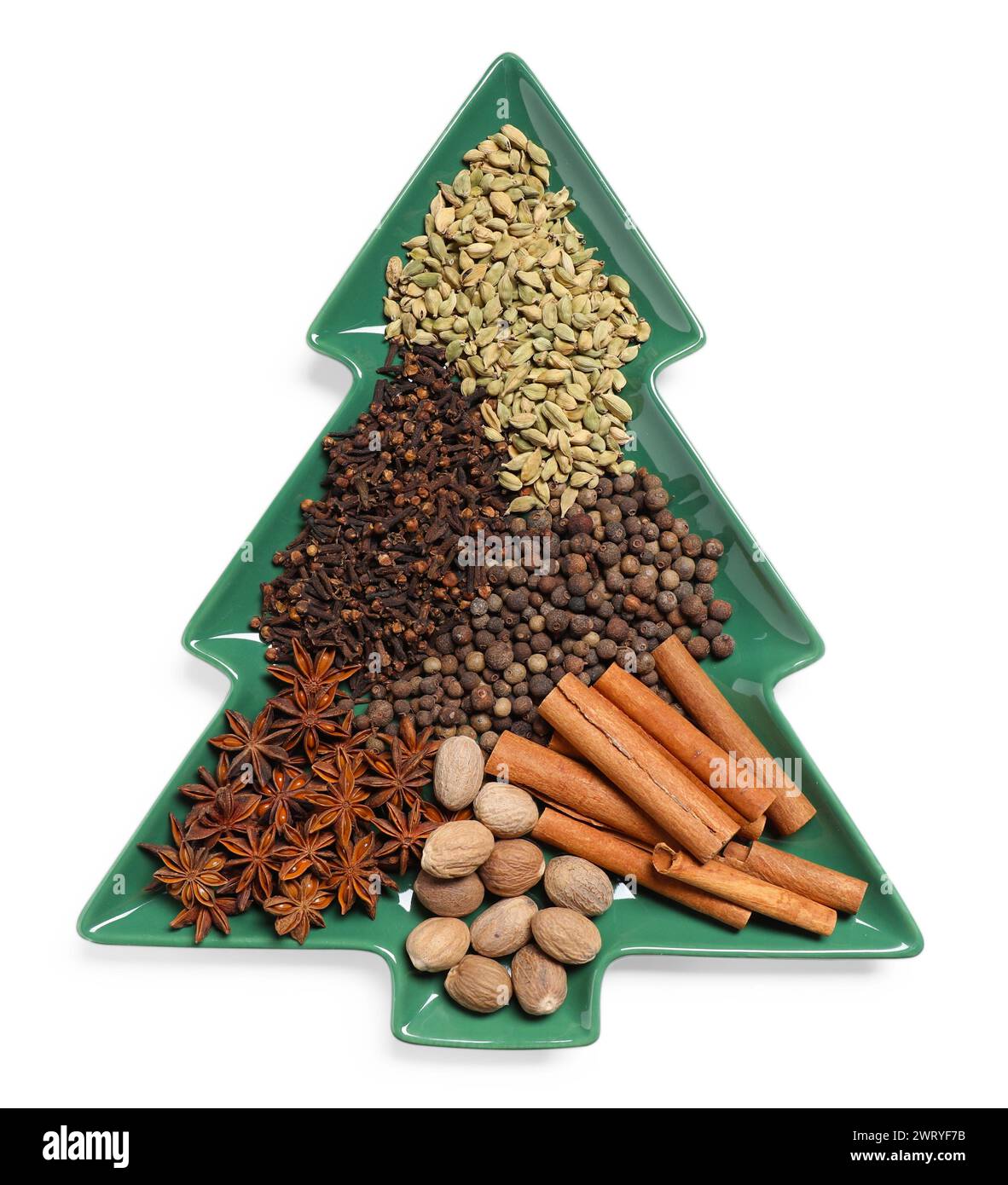 Different spices and nuts isolated on white, top view Stock Photo