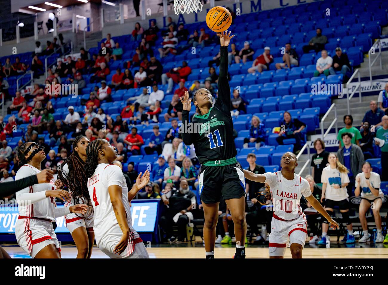 Texas A&M Corpus Christi guard Paige Allen (11) shoots against Lamar