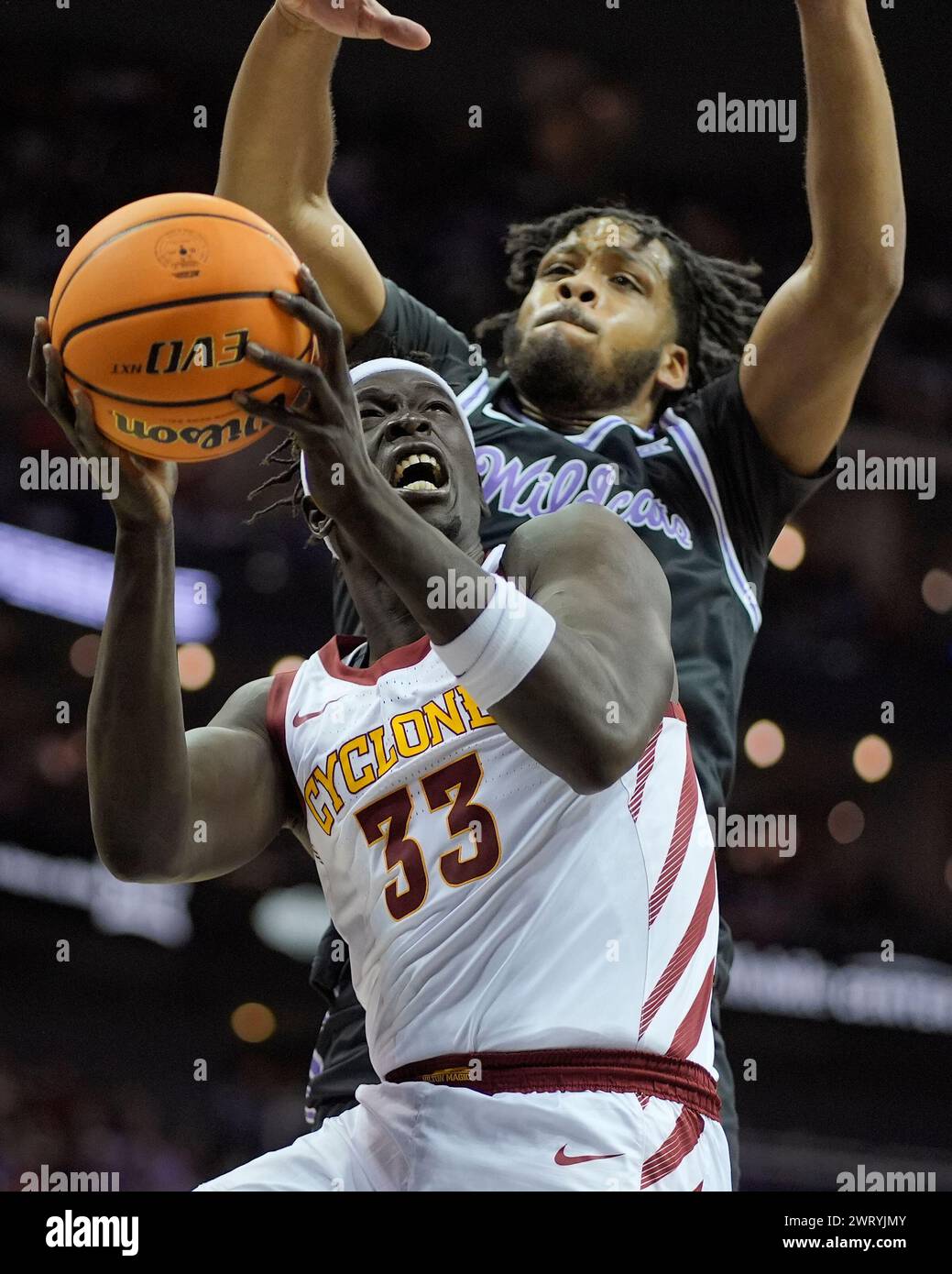 Iowa State forward Omaha Biliew (33) looks shoot under pressure from ...