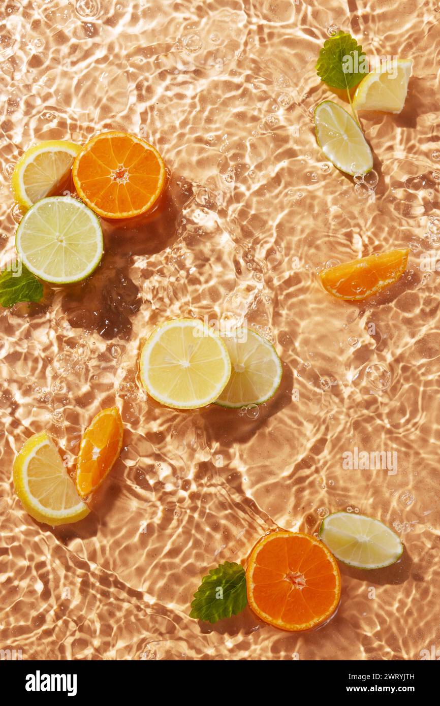 a side of citrus fruit floating on the water Stock Photo