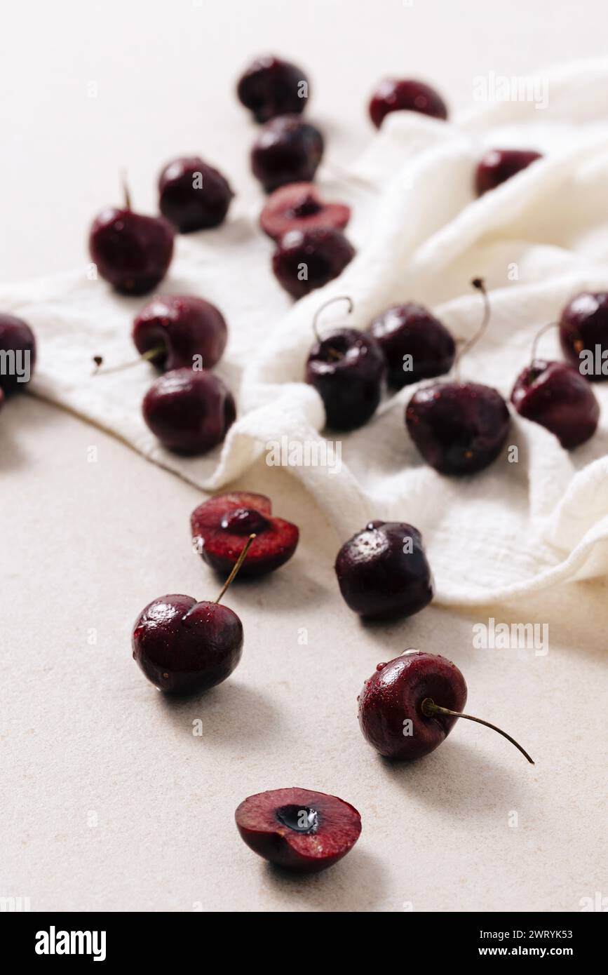 well cooked cherries scattered over the white ceiling Stock Photo