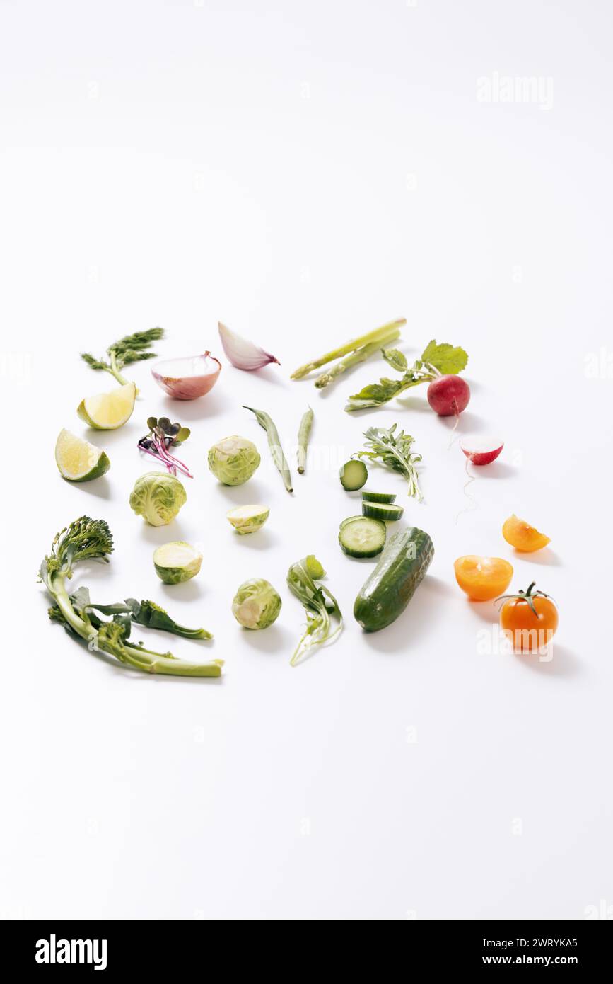 fresh salad vegetable ingredients with white background Stock Photo