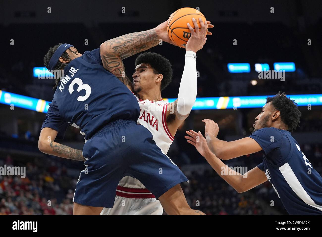 Indiana center Kel'el Ware, center, works toward the basket as Penn
