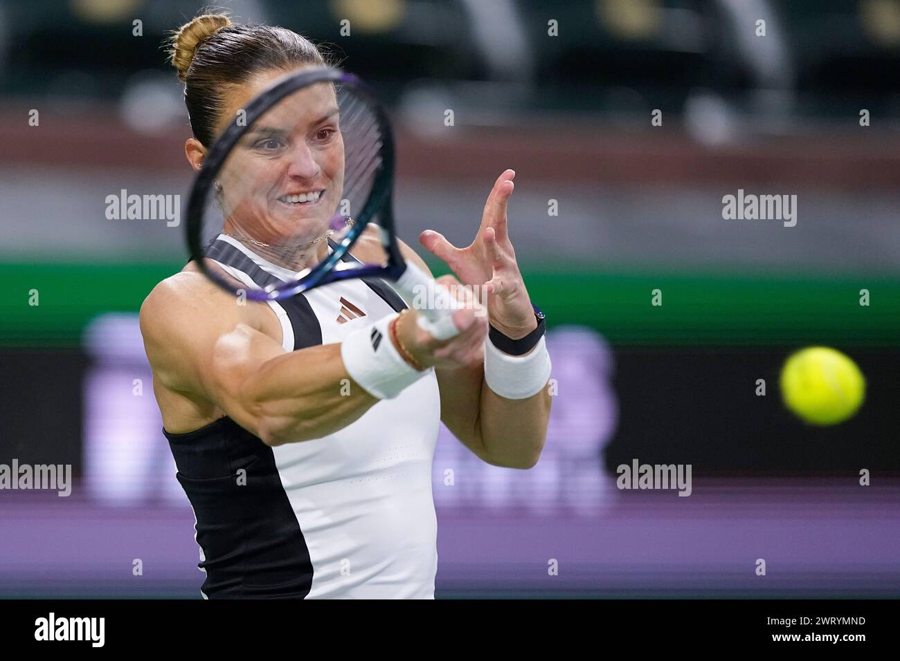 Maria Sakkari, of Greece, returns to Emma Navarro, of the United States