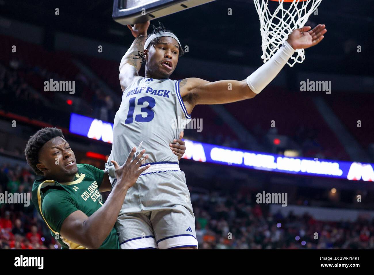 Colorado State guard Isaiah Stevens, left, collides into Nevada guard