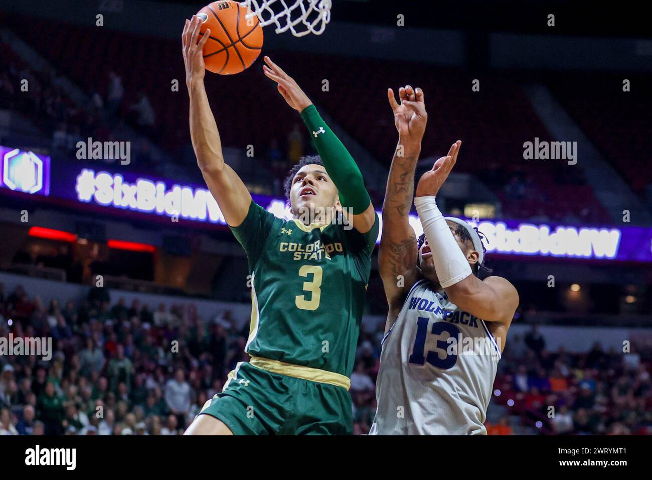 Colorado State guard Josiah Strong (3) shoots over Nevada guard Kenan