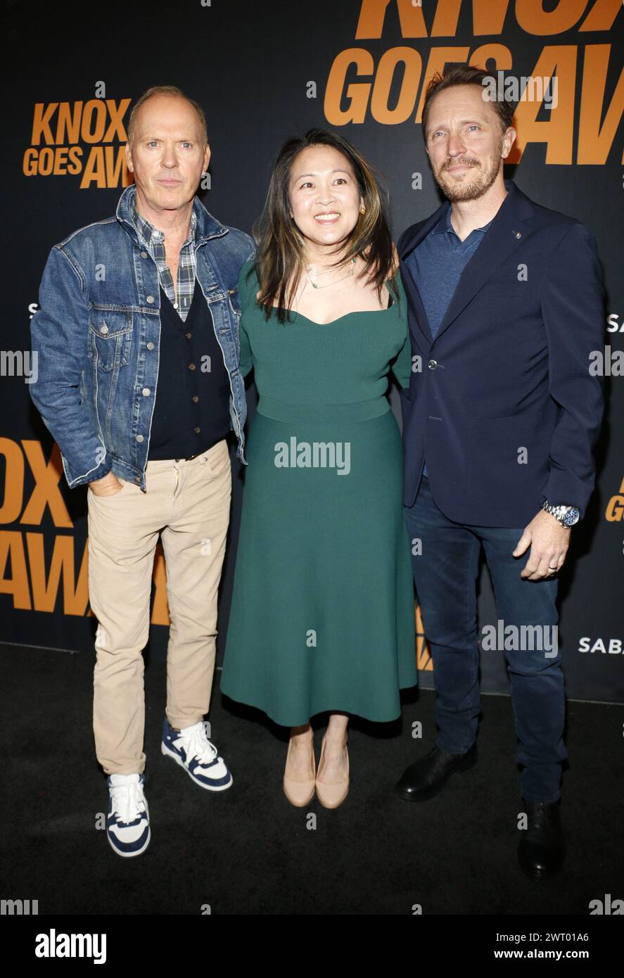 Michael Keaton, Suzy Nakamura and John Hoogenakker at the Los Angeles premiere of 'Knox Goes Away' held at the Academy Museum of Motion Pictures in Los Angeles, USA on March 14, 2024. Stock Photo