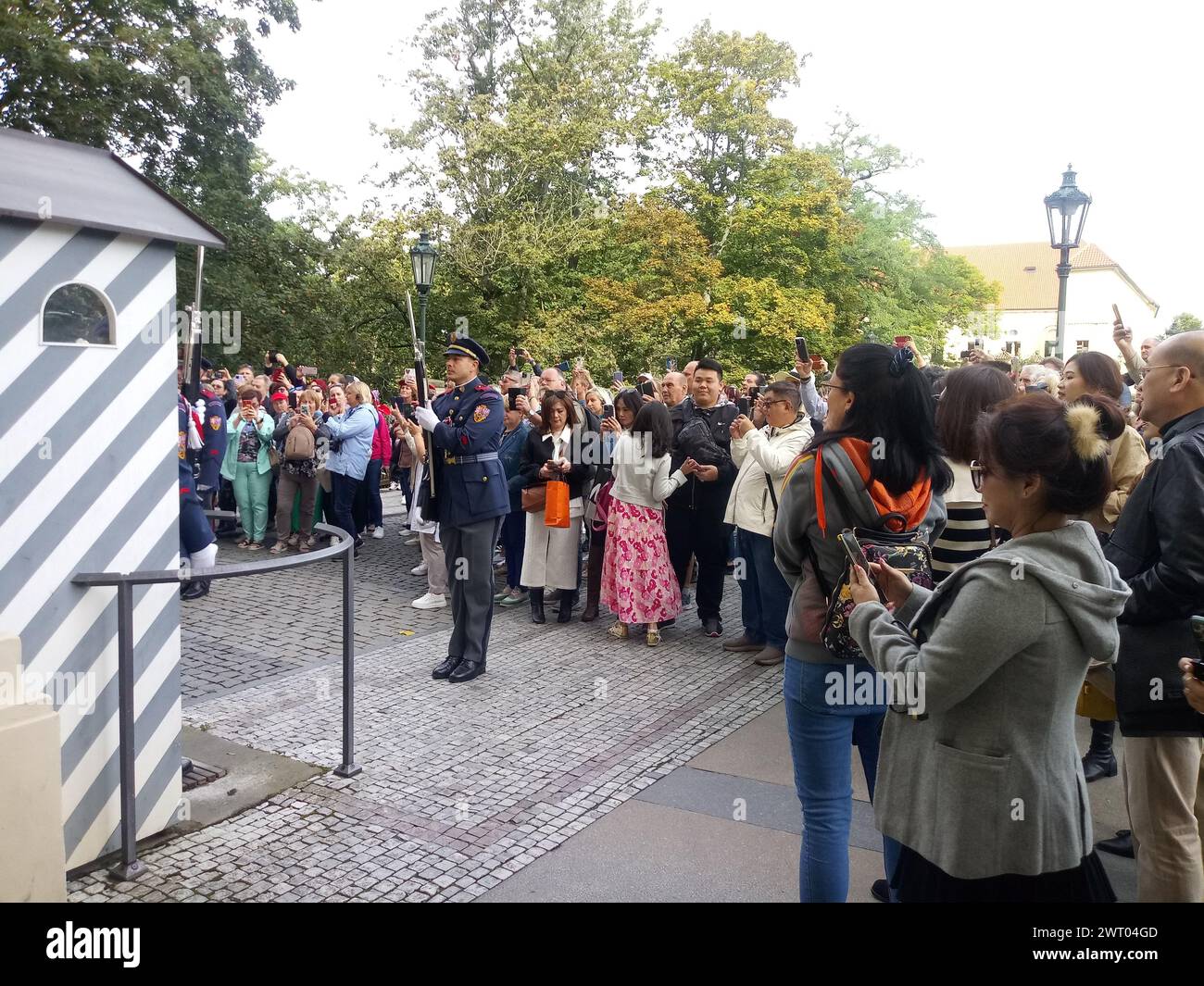 Prague, Czech Republic, September 23, 2023: Crowded place in front of the Prague castle. Spectators are watching the ceremonial changing of the guards Stock Photo