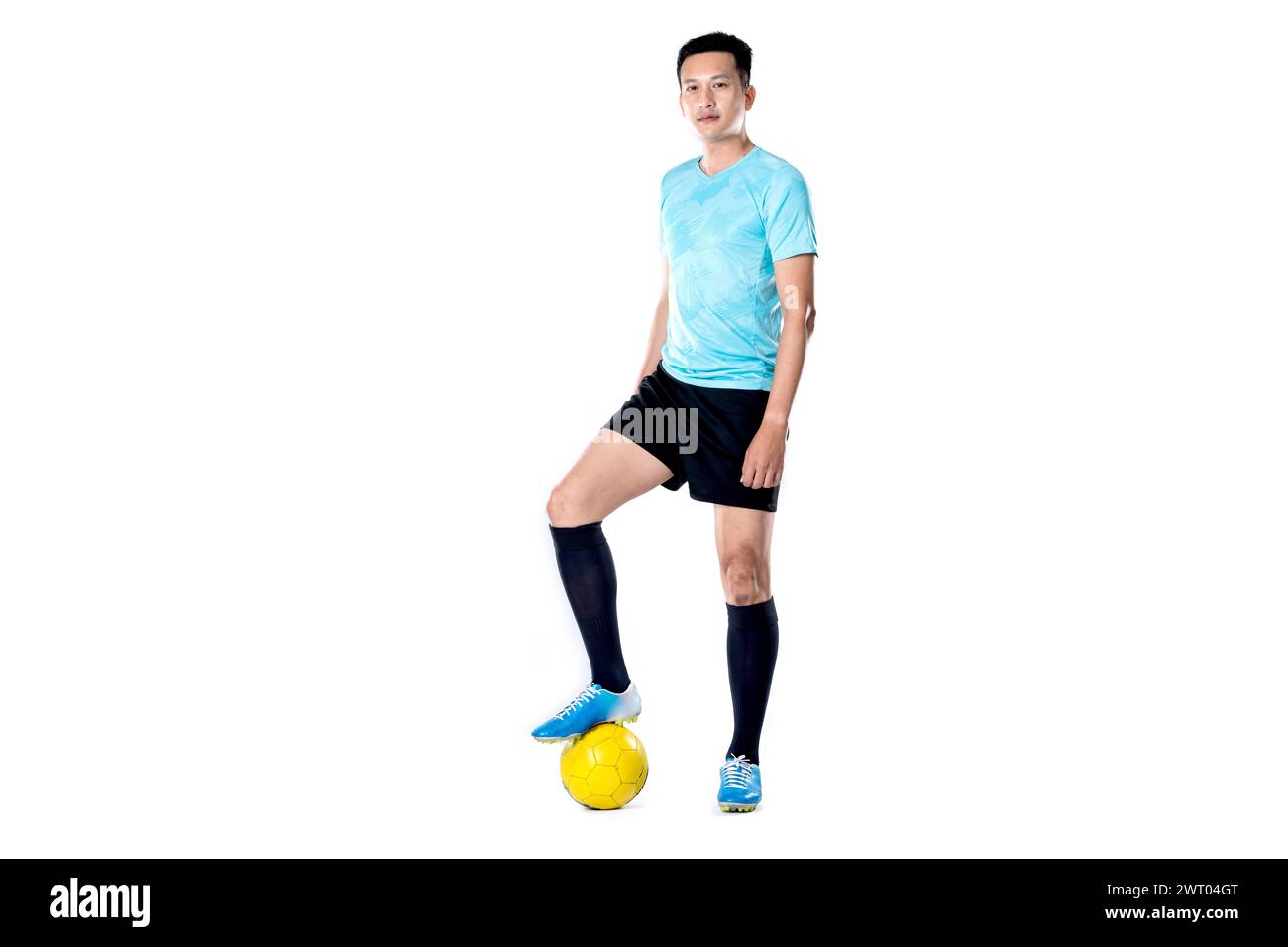 Soccer referee with Soccer ball isolated on white background. Stock Photo