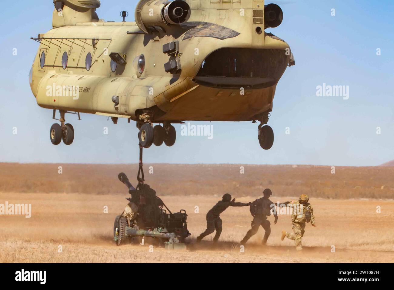 Fort Bliss, Texas, USA. 1st Mar, 2024. U.S. Army Soldiers of Bravo Battery, 3rd Battalion, 112th Field Artillery Regiment, 44th Infantry Brigade Combat Team, New Jersey Army National Guard, perform sling load operations with CH-47 Chinook helicopter support at Fort Bliss, Texas, March 1, 2024. The exercise was part of a combined arms live fire exercise as the 44th IBCT prepares for deployment in support of U.S. Central Command's Combined Joint Task Force - Operation Inherent Resolve. (photo by Bruce Daddis) (Credit Image: © U.S. Army/ZUMA Press Wire) EDITORIAL USAGE ONLY! Not for Commercial Stock Photo