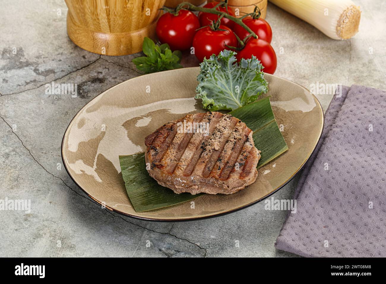 Grilled tuna medallion in the plate with spices Stock Photo Alamy