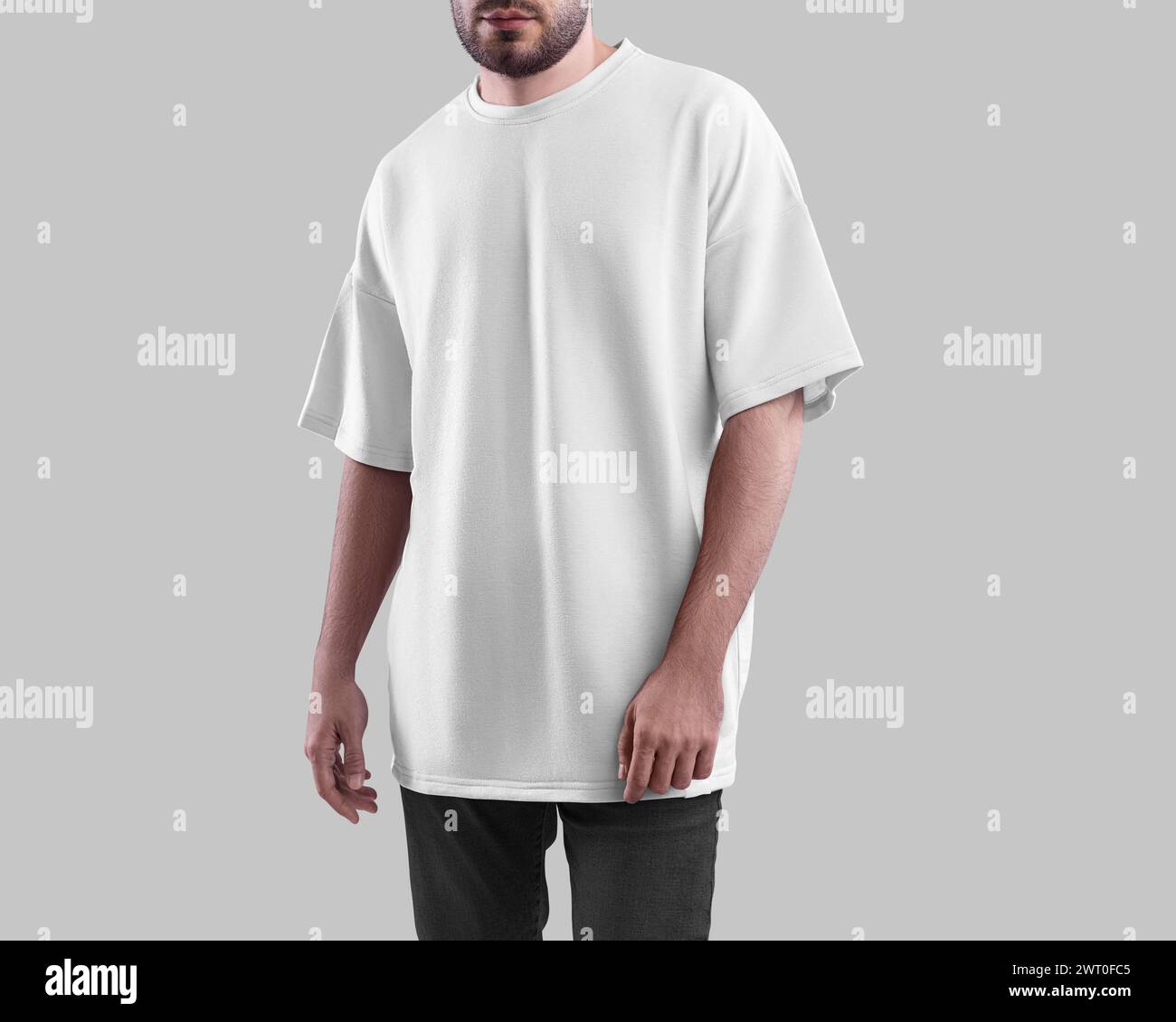 Oversized white t-shirt mockup on bearded man, fashion streetwear for design, print, pattern, branding, front view. Template textured casual apparel, Stock Photo