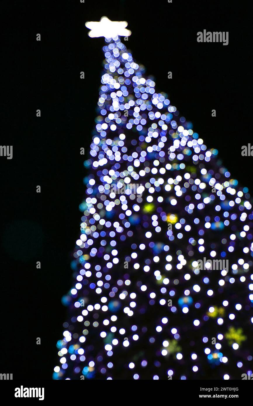 christmas tree from color lights on the black background Stock Photo ...