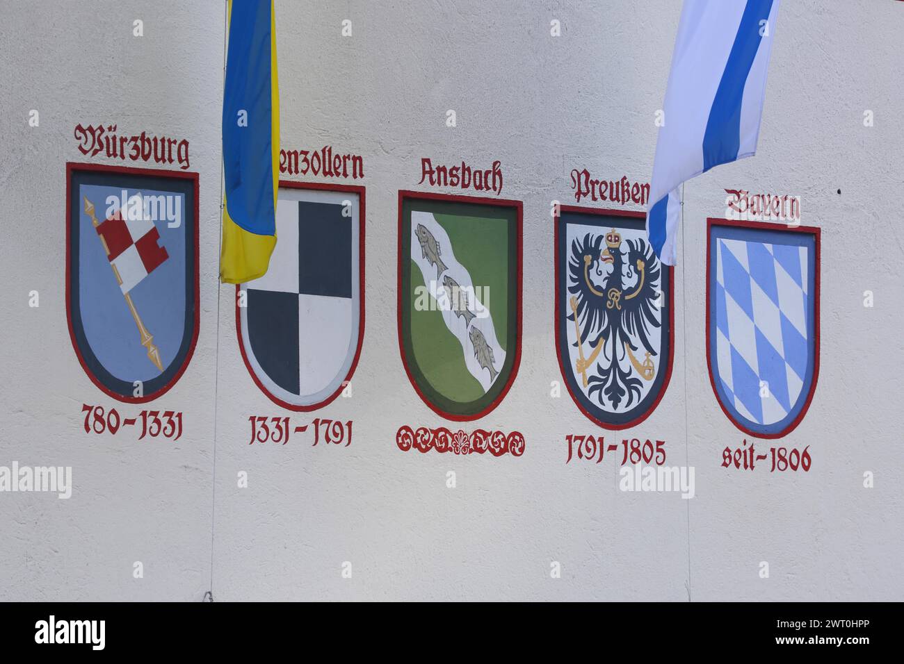 Coat of arms for the city history, city chronicle with Wuerzburg, Hohenzollern, city coat of arms, Prussia, Bavaria, inscription, flags, town hall Stock Photo
