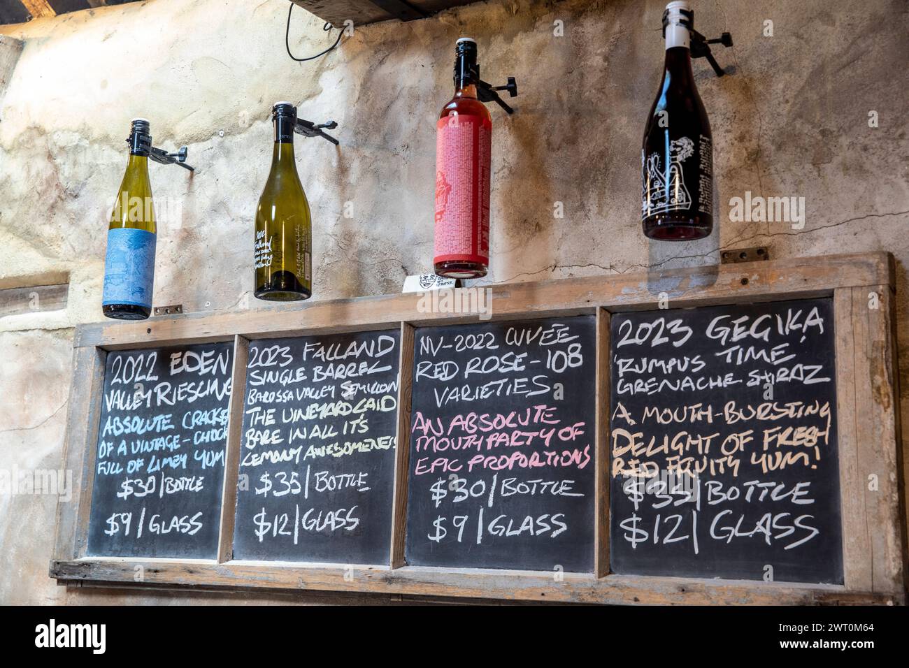 Barossa Valley, David Franz cellar door and list of wines on the blackboard with wine bottles hanging above,South Australia,2024 Stock Photo