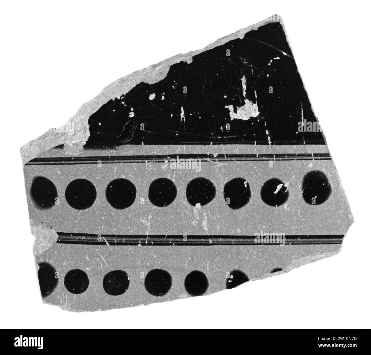 Attic Red-Figure Column Krater Fragment. Unknown 5th century B.C. Exterior, part of framing pattern (two columns of dots). Interior, black. Stock Photo