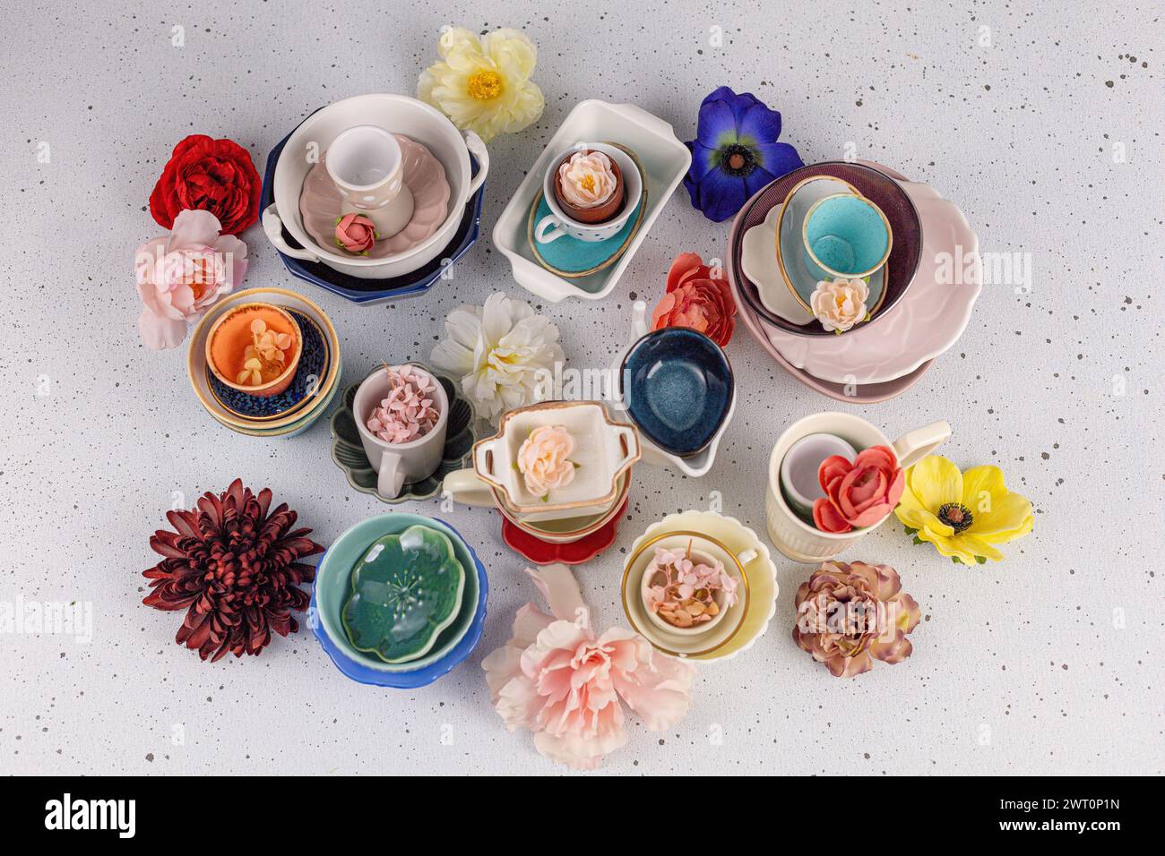 top view beautiful Tableware Composition with Floral Accents Stock Photo