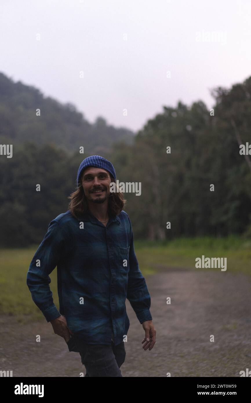 Man walking in forest fog trees hi-res stock photography and images - Alamy