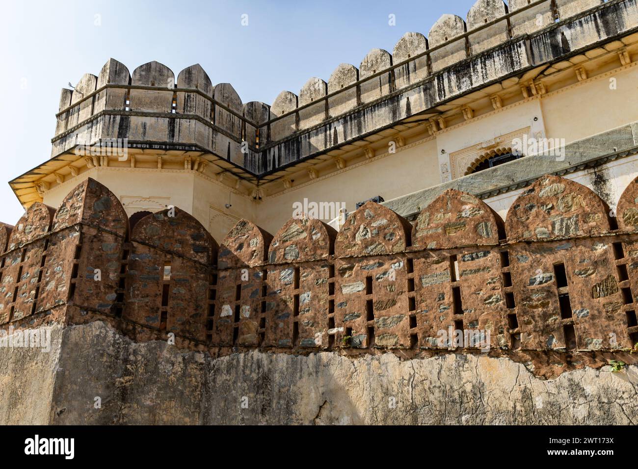 ancient fort stone wall with bright blue sky at morning image is taken ...