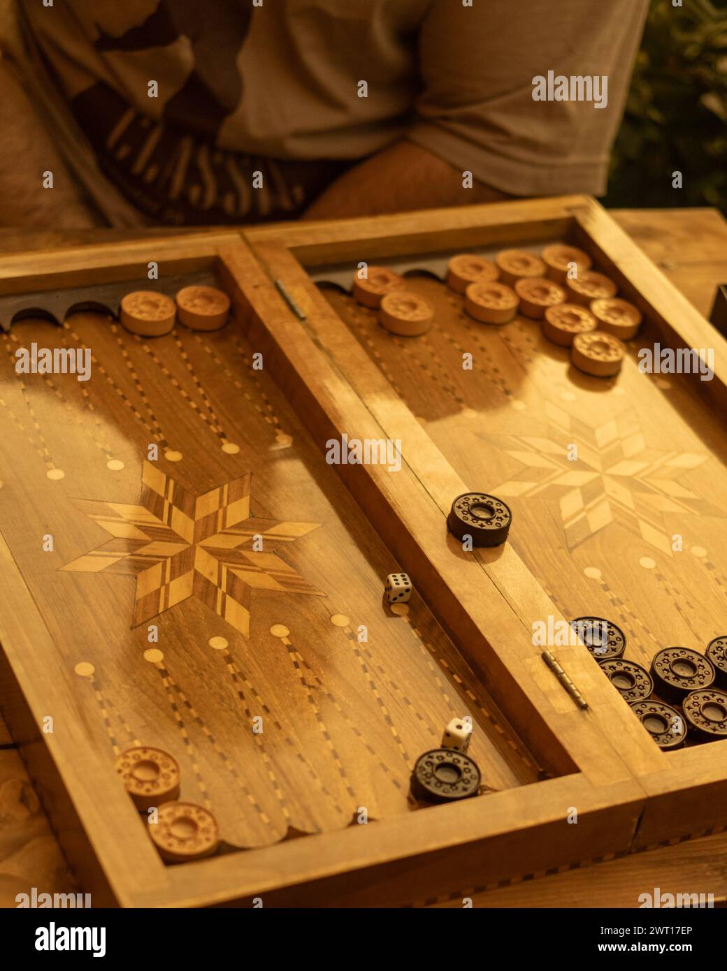 A top view of people playing backgammon Stock Photo