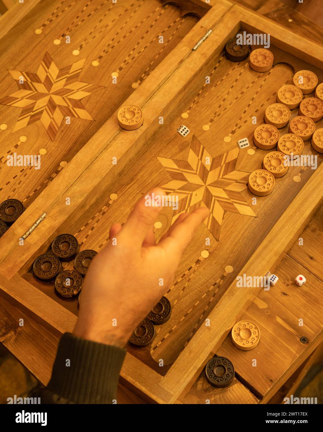 A top view of people playing backgammon Stock Photo