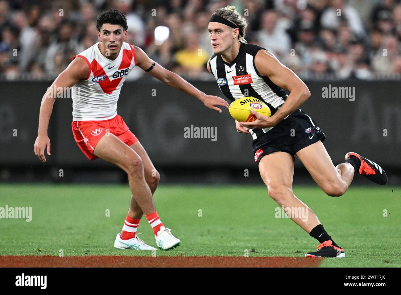 Melbourne, Australia. 15th Mar, 2024. Darcy Moore of Collingwood (right