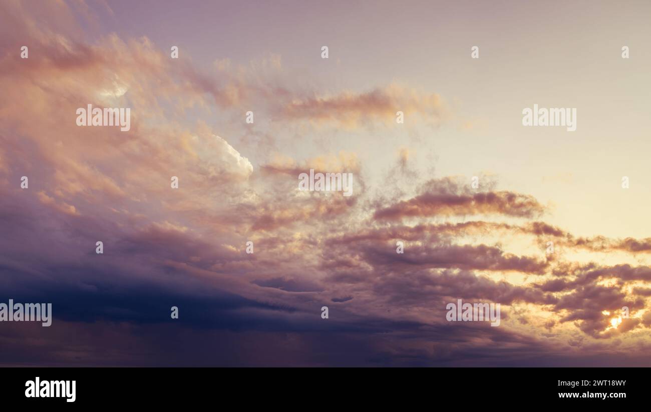 Sunset sky with orange clouds. Nature background Stock Photo - Alamy