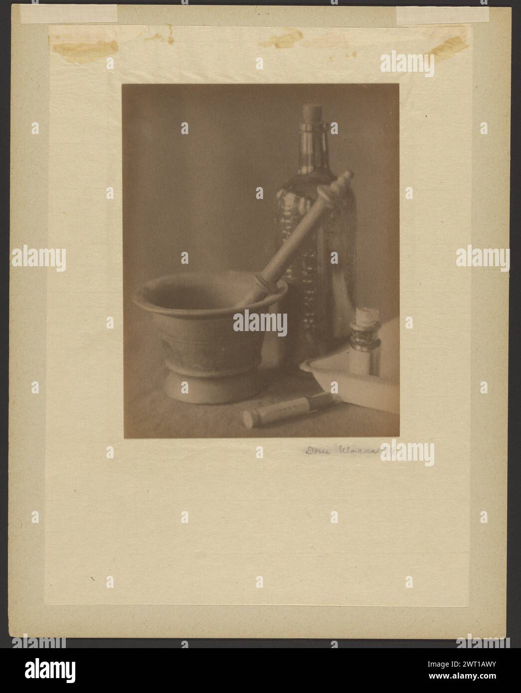 Darkroom Still Life. Doris Ulmann, photographer (American, 1882 - 1934) 1918 This still-life assembly of mortar, pestle, bottles, vial, and developing tray evokes the element of alchemy in photography. These objects immediately refer to the practice of medicine and to its potential power to stimulate the body's regenerative processes. In a related way, photography can be understood as the artist measuring and applying certain powders and liquids to create an image, one with the power to heal the spirit and to nourish and give life to the imagination and the soul. By photographing the tools of Stock Photo