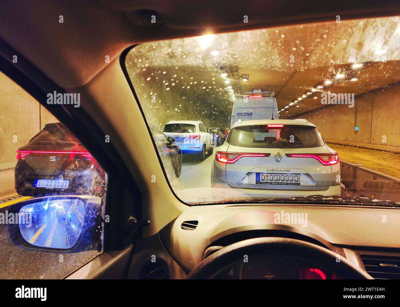 view from the car in the tunnel on the A 52 highway in slow-moving traffic, Germany, North Rhine-Westphalia, Ruhr Area, Essen Stock Photo