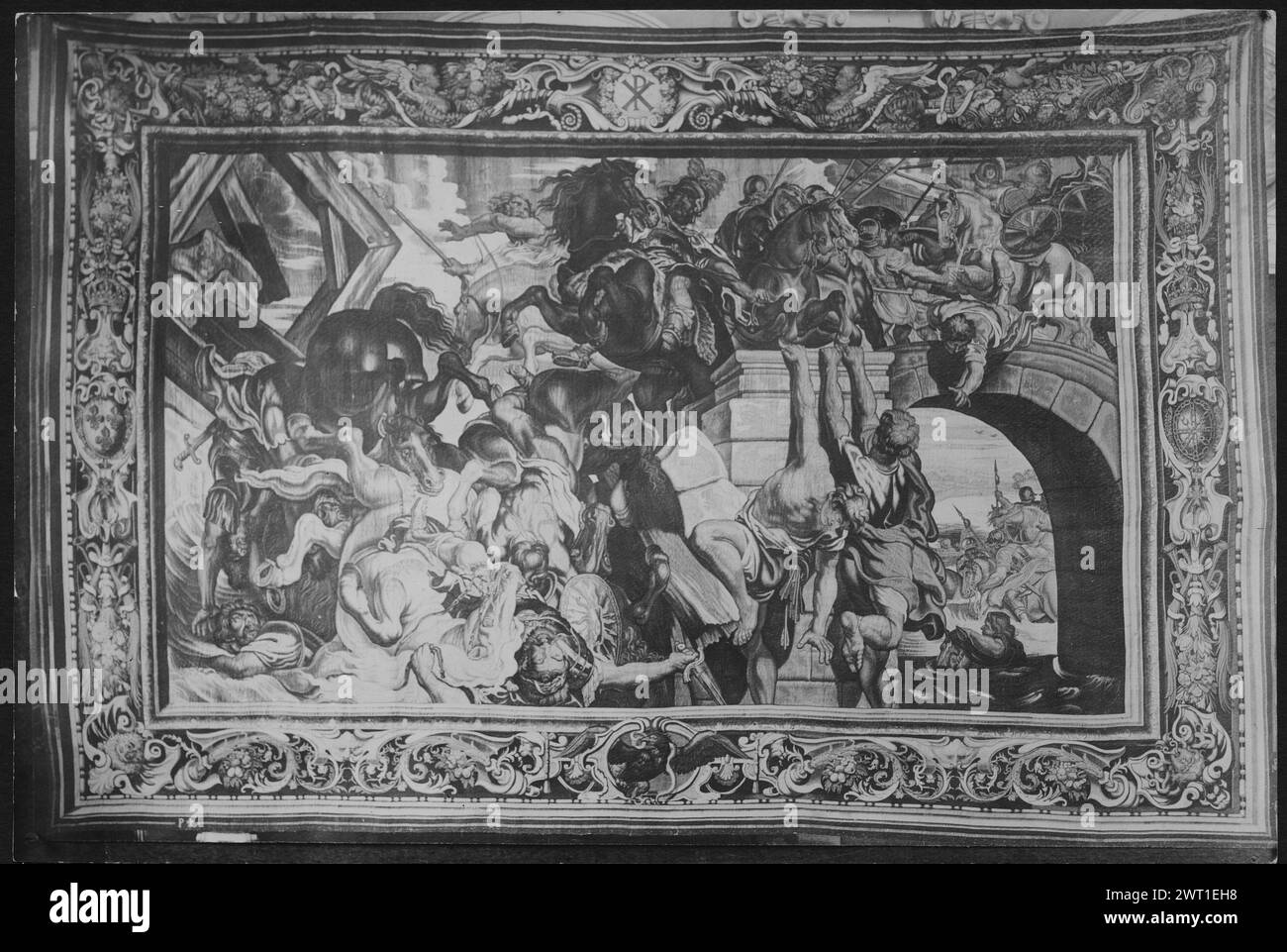Battle of Milvian Bridge. Rubens, Peter Paul (Flemish, 1577-1640) (author of design, cartoon creator) [painter] Maecht, Philipp de (Flemish, act. 1605-1652, d. bef.1655) (workshop) [weaver] Tayer, Hans (Flemish, act. ca.1619) (workshop) [weaver] c. 1623-1625 Tapestry Dimensions: H 16'2' x W 24'2.5' Tapestry Materials/Techniques: Linen (warp: 28/in.); wool, silk with silver & gold metallic thread (weft) Culture: French Weaving Center: Paris Ownership History: Barberini coll. (Rome). Corsini coll., 1907. Private coll. (London), 1924. French & Co. purchased from the estate of Rosa Lewis, received Stock Photo