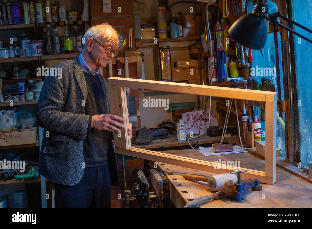 Henry Marsh , leading British neurosurgeon and author of the book Do No Harm at his wood workshop in London . Stock Photo