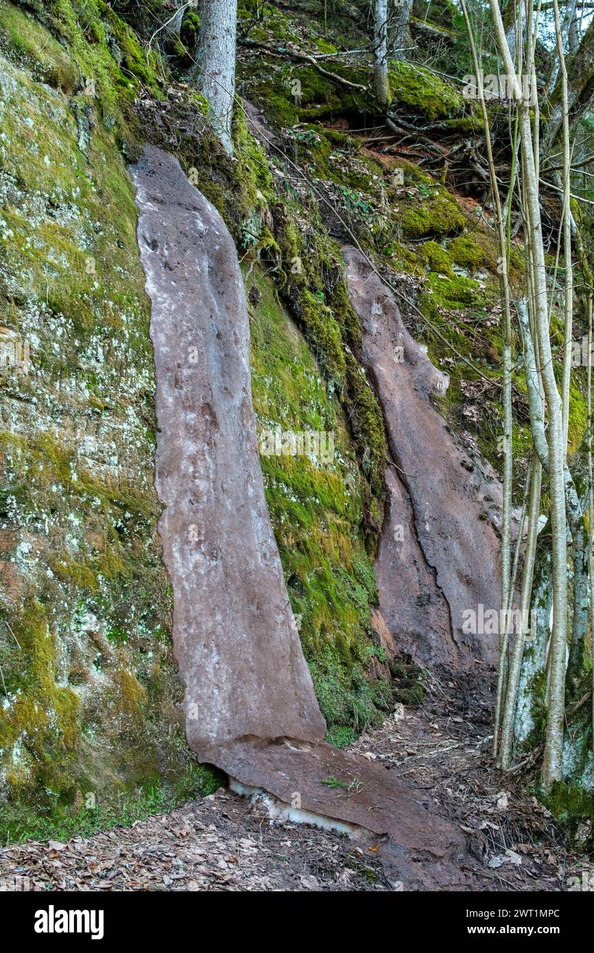 The red cliffs of Cesis are a haven for hikers and nature enthusiasts, offering endless opportunities for exploration and adventure Stock Photo