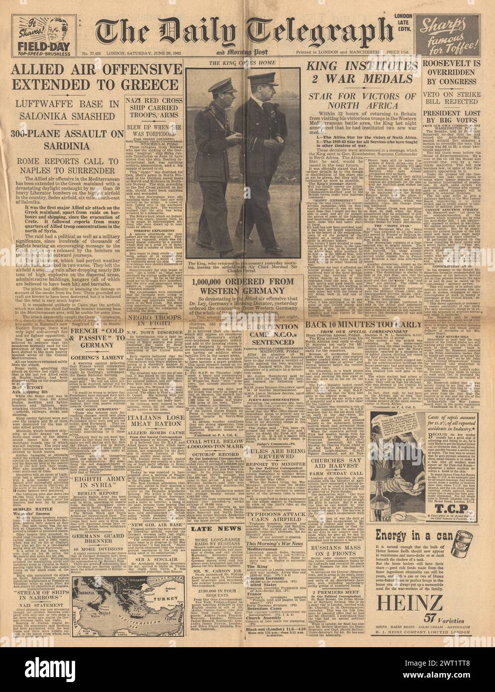 1943 The Daily Telegraph front page reporting Allies bomb Greece, King institutes two new war medals and US Coal strike Stock Photo