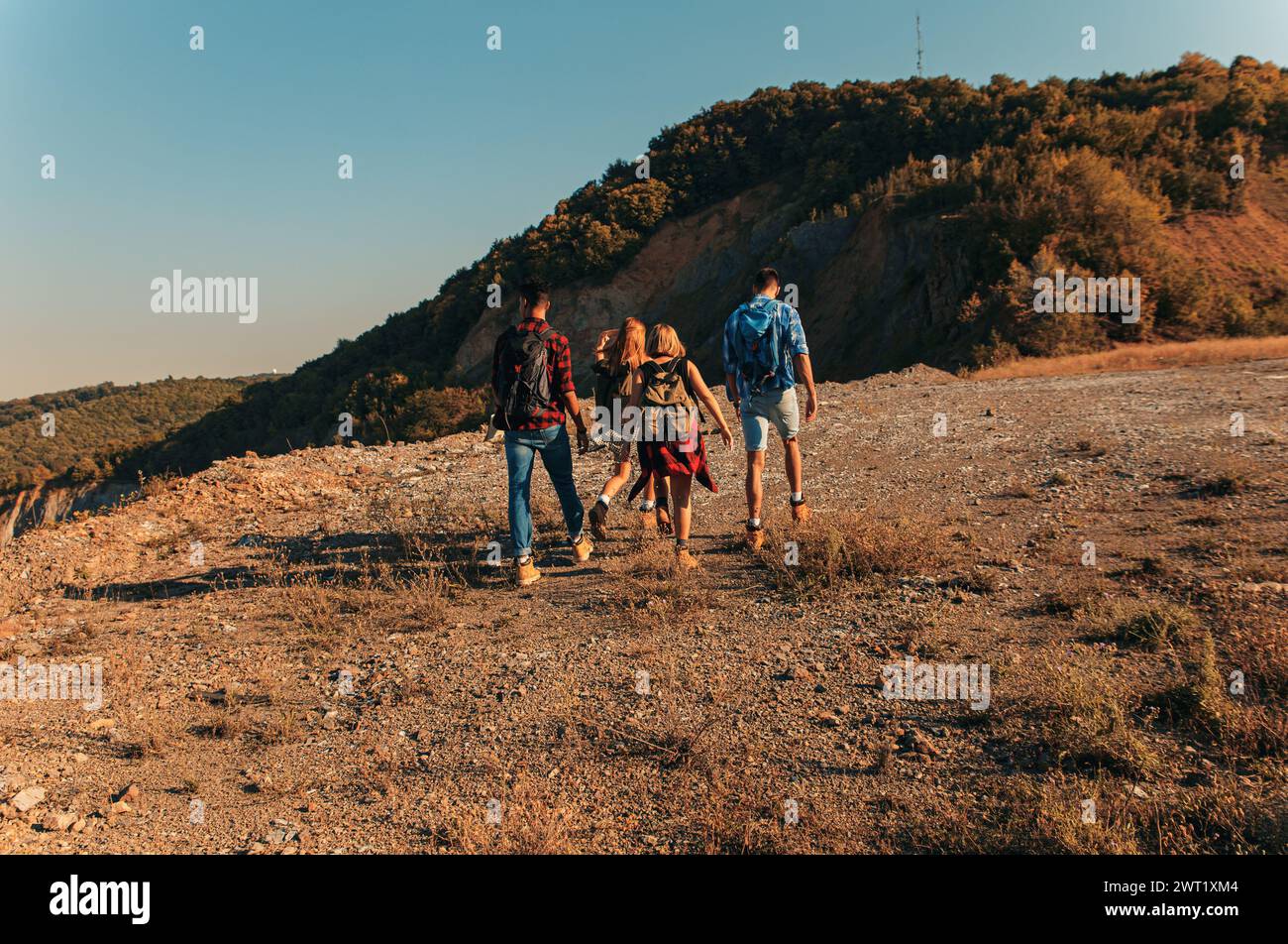 Group smiling friends hiking hi-res stock photography and images - Alamy