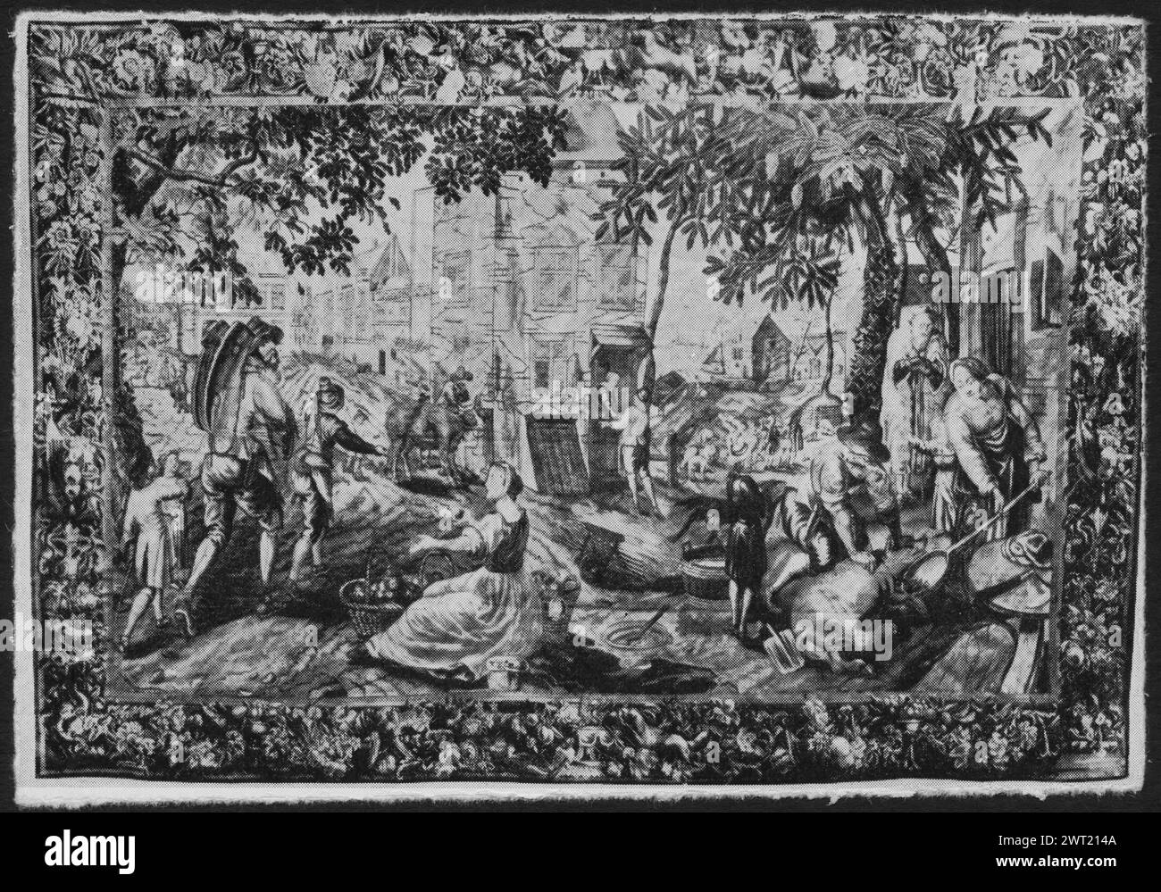 Pig slaughtering. unknown c. 1690-1710 Tapestry Materials/Techniques: unknown Culture: Flemish Weaving Center: Antwerp In open space before manor, various groups of figures, including man carrying load & turning towards onlooker (L, foreground), seated maid with fruit filled basket (L of center), man killing pig next to boy & woman holding out bowl on long handle to catch blood (R); before inn, man with cow (L of center, middle ground), & man conversing with maid (R of center); houses & figures visible in background (BRD) garland of flowers & fruits interspersed with dogs & other animals Stock Photo