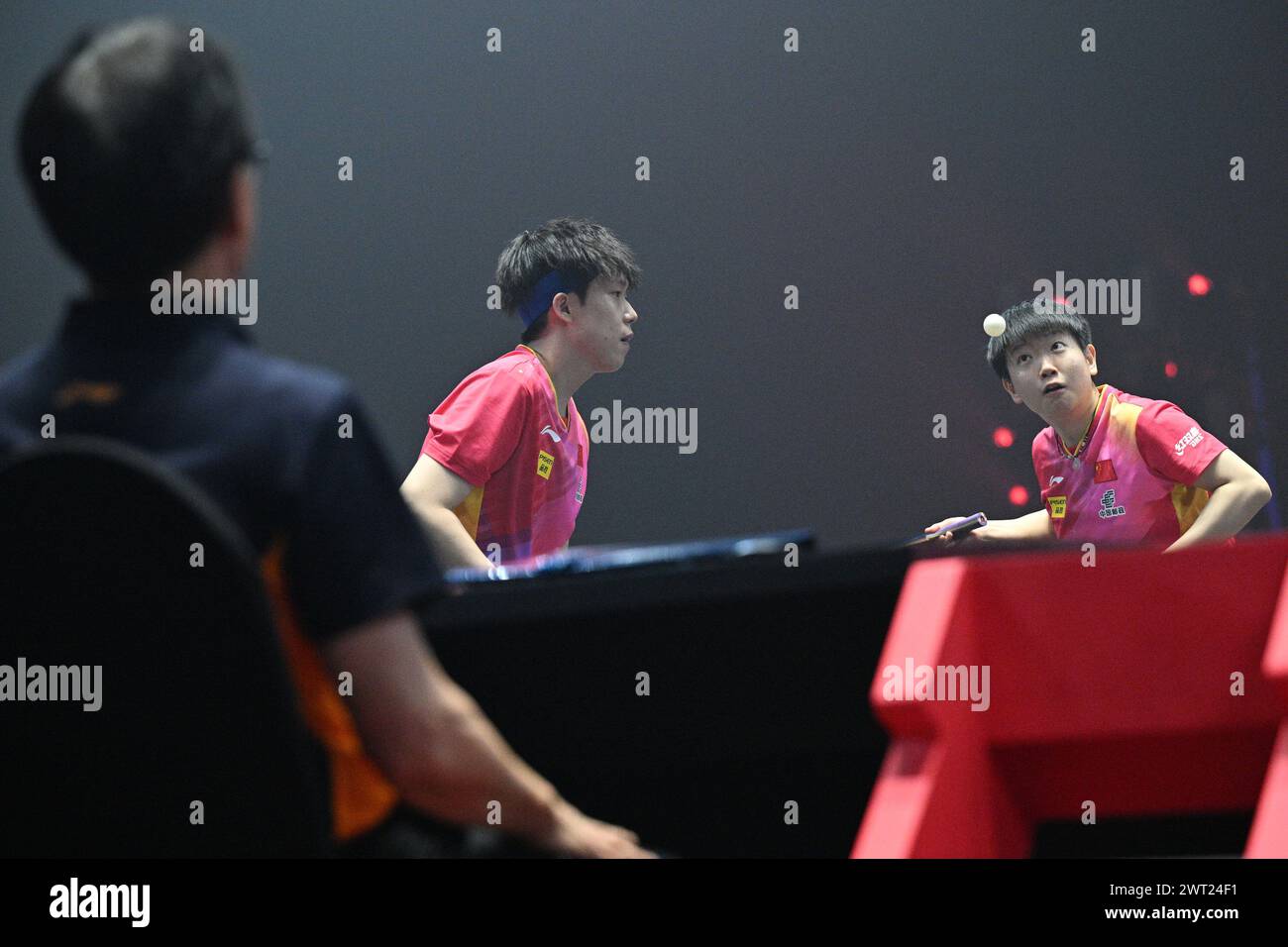 Singapore. 15th Mar, 2024. Sun Yingsha (R)/Wang Chuqin of China compete