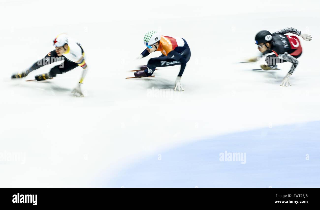 ROTTERDAM - 05/03/2024, (l-r) Stijn Desmet (BEL), Kay Huisman (NED), Furkan Akar (TUR) during the preliminary rounds of the 500 meters men at the World Short Track Championships in Ahoy. ANP KOEN VAN WEEL Stock Photo